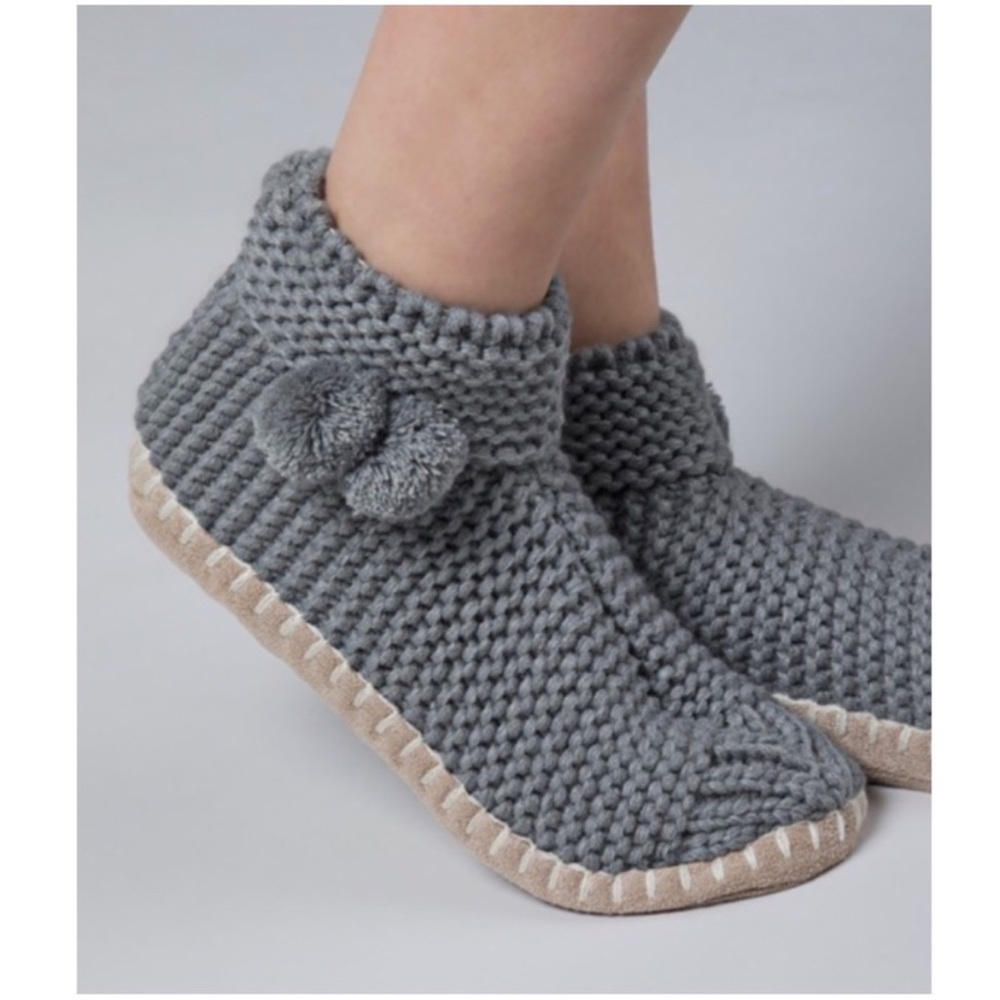 Ruggine Handknit Garter Stitched Slipper Boot With Pom Pom Detail.